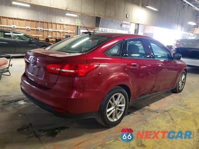 Trzecie zdjęcie samochodu z tyłu: 2016 FORD FOCUS SE VIN:1FADP3F24GL327720 - miniatura