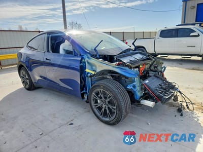 Czwarte zdjęcie samochodu z boku: 2024 TESLA MODEL Y VIN:7SAYGDEDXRF108466 - miniatura