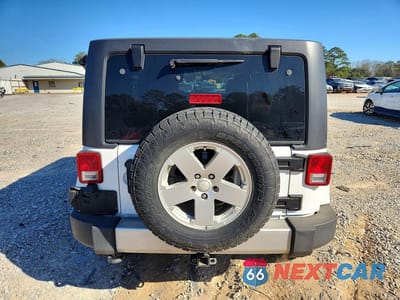 Zdjęcie 6 z 14 samochodu: 2012 JEEP WRANGLER UNLIMITED SAHARA VIN:1C4HJWEG9CL279685 - miniatura