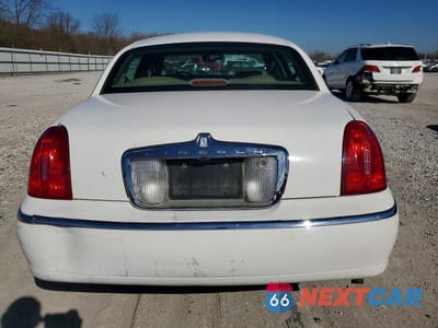 Zdjęcie 6 z 13 samochodu: 2000 LINCOLN TOWN CAR SIGNATURE VIN:1LNHM82W6YY887586 - miniatura