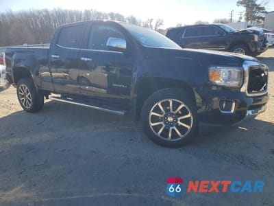 Czwarte zdjęcie samochodu z boku: 2019 GMC CANYON DENALI VIN:1GTG6EEN9K1315374 - miniatura