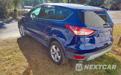Trzecie zdjęcie samochodu z tyłu: 2013 FORD ESCAPE SE VIN:1FMCU9GXXDUD95226 - miniatura