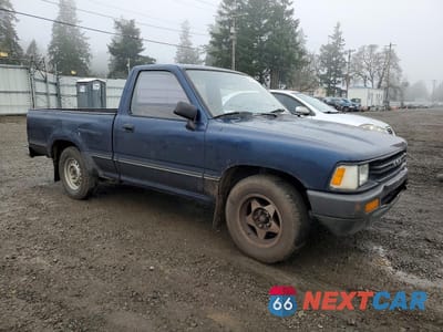Czwarte zdjęcie samochodu z boku: 1991 TOYOTA PICKUP 1/2 TON SHORT WHEELBASE VIN:JT4RN81A2M5128456 - miniatura