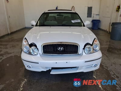 Piąte zdjęcie samochodu w środku: 2002 HYUNDAI SONATA GLS VIN:KMHWF35H72A685874 - miniatura