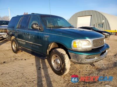 Czwarte zdjęcie samochodu z boku: 1998 FORD EXPEDITION VIN:1FMPU18L5WLC17571 - miniatura