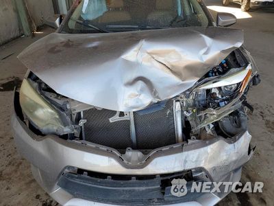 Zdjęcie 11 z 12 samochodu: 2014 TOYOTA COROLLA L VIN:5YFBURHE5EP119581 - miniatura
