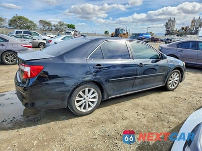 Trzecie zdjęcie samochodu z tyłu: 2012 TOYOTA CAMRY HYB VIN:4T1BD1FK9CU053557 - miniatura