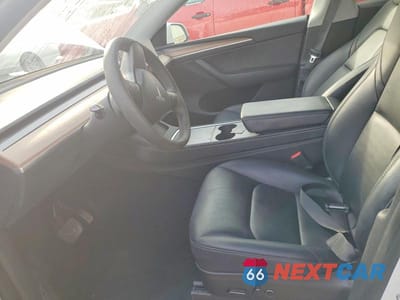 Zdjęcie 7 z 12 samochodu: 2023 TESLA MODEL Y VIN:7SAYGDEE0PF612059 - miniatura