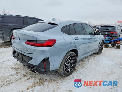 Trzecie zdjęcie samochodu z tyłu: 2022 BMW X4 XDRIVE30I VIN:5UX33DT07N9K66947 - miniatura