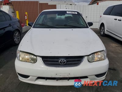 Piąte zdjęcie samochodu w środku: 2001 TOYOTA COROLLA CE VIN:1NXBR12E51Z462945 - miniatura