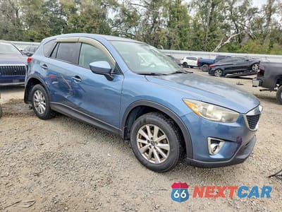 Czwarte zdjęcie samochodu z boku: 2015 MAZDA CX-5 TOURING VIN:JM3KE2CY3F0461216 - miniatura