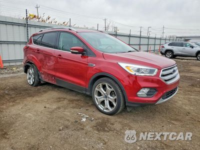 Czwarte zdjęcie samochodu z boku: 2019 FORD ESCAPE TITANIUM VIN:1FMCU9J98KUA45035 - miniatura