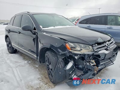 Czwarte zdjęcie samochodu z boku: 2013 VOLKSWAGEN TOUAREG V6 VIN:WVGEF9BP3DD006761 - miniatura