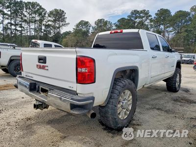 Czwarte zdjęcie samochodu z boku: 2018 GMC SIERRA K2500 SLT VIN:1GT12TEY9JF240600 - miniatura