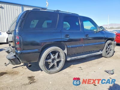 Trzecie zdjęcie samochodu z tyłu: 2001 CHEVROLET TAHOE C1500 VIN:1GNEC13T01J120621 - miniatura