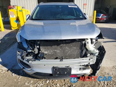 Piąte zdjęcie samochodu w środku: 2021 BUICK ENCLAVE ESSENCE VIN:5GAEVAKW9MJ130908 - miniatura