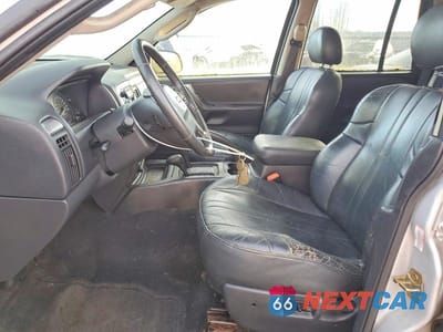 Zdjęcie 7 z 13 samochodu: 2004 JEEP GRAND CHEROKEE LAREDO VIN:1J4GW48S04C343903 - miniatura