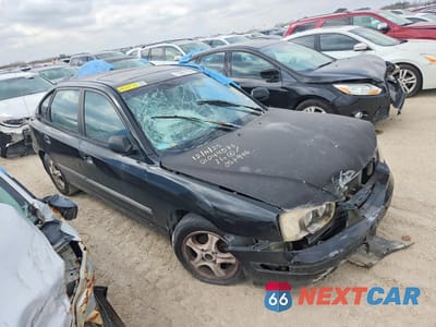 Czwarte zdjęcie samochodu z boku: 2002 HYUNDAI ELANTRA VIN:KMHDN55D92U057946 - miniatura