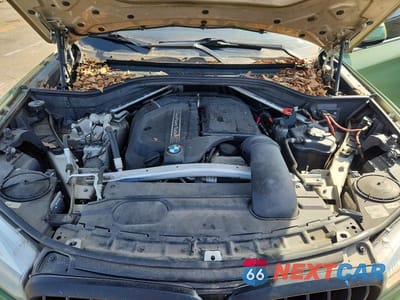 Zdjęcie 12 z 13 samochodu: 2014 BMW X5 SDRIVE35I VIN:5UXKR2C59E0H31603 - miniatura