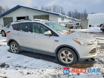 Czwarte zdjęcie samochodu z boku: 2014 FORD ESCAPE SE VIN:1FMCU9GX1EUD62195 - miniatura