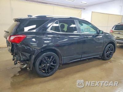 Trzecie zdjęcie samochodu z tyłu: 2021 CHEVROLET EQUINOX LT VIN:3GNAXKEV0ML369313 - miniatura