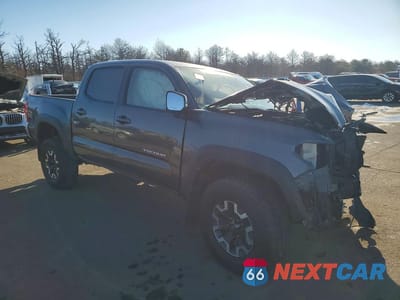 Czwarte zdjęcie samochodu z boku: 2016 TOYOTA TACOMA DOUBLE CAB VIN:3TMCZ5ANXGM034237 - miniatura