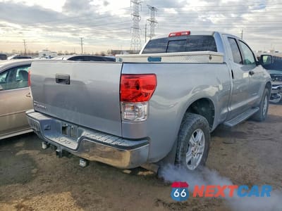 Trzecie zdjęcie samochodu z tyłu: 2010 TOYOTA TUNDRA DOUBLE CAB SR5 VIN:5TFRY5F16AX077915 - miniatura