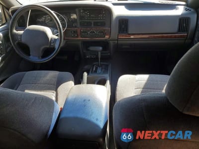 Zdjęcie 8 z 13 samochodu: 1998 JEEP GRAND CHEROKEE LAREDO VIN:1J4FX58S3WC281298 - miniatura