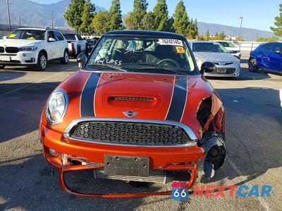 Piąte zdjęcie samochodu w środku: 2011 MINI COOPER S VIN:WMWSV3C56BTY13862 - miniatura