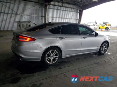 Trzecie zdjęcie samochodu z tyłu: 2018 FORD FUSION SE VIN:3FA6P0HD0JR181136 - miniatura
