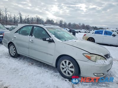 Czwarte zdjęcie samochodu z boku: 2003 TOYOTA CAMRY LE VIN:4T1BF32K93U551642 - miniatura
