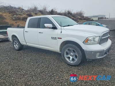 Czwarte zdjęcie samochodu z boku: 2016 RAM 1500 LARAMIE VIN:1C6RR7VM7GS296514 - miniatura