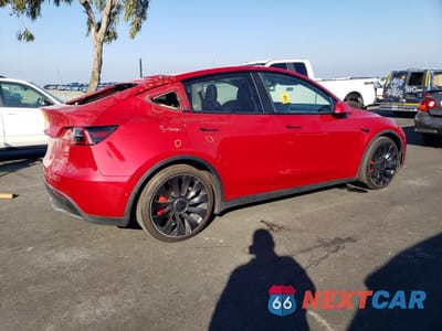 Trzecie zdjęcie samochodu z tyłu: 2022 TESLA MODEL Y VIN:7SAYGDEF5NF486819 - miniatura