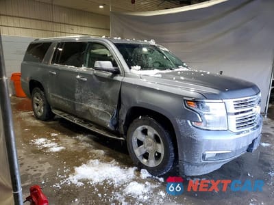 Czwarte zdjęcie samochodu z boku: 2018 CHEVROLET SUBURBAN K1500 PREMIER VIN:1GNSKJKC4JR381422 - miniatura