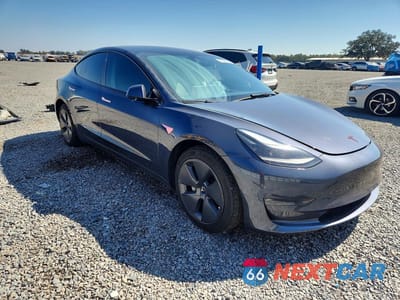Czwarte zdjęcie samochodu z boku: 2023 TESLA MODEL 3 VIN:5YJ3E1EB2PF391839 - miniatura