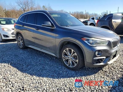 Czwarte zdjęcie samochodu z boku: 2016 BMW X1 XDRIVE28I VIN:WBXHT3Z3XG4A47800 - miniatura