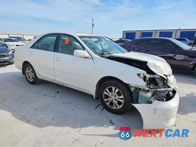Czwarte zdjęcie samochodu z boku: 2006 TOYOTA CAMRY LE VIN:4T1BF32K16U624426 - miniatura
