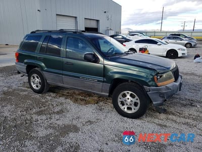 Czwarte zdjęcie samochodu z boku: 2001 JEEP GRAND CHEROKEE LAREDO VIN:1J4GW48NX1C531656 - miniatura