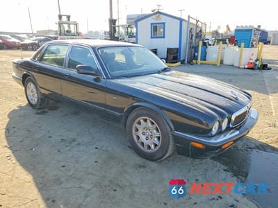 Czwarte zdjęcie samochodu z boku: 1999 JAGUAR XJ8 VIN:SAJHD1040XC869269 - miniatura