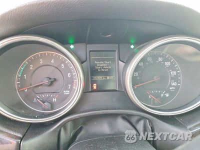 Zdjęcie 9 z 13 samochodu: 2012 JEEP GRAND CHEROKEE LAREDO VIN:1C4RJFAG9CC133054 - miniatura