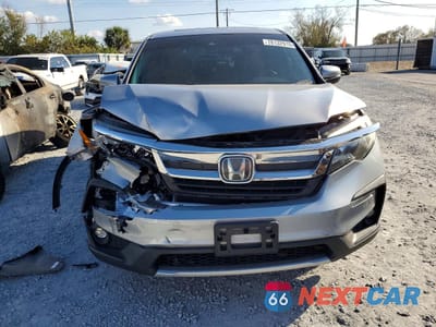 Piąte zdjęcie samochodu w środku: 2020 HONDA PILOT EXL VIN:5FNYF6H53LB039157 - miniatura