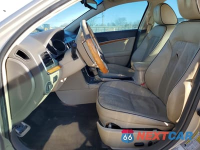 Zdjęcie 7 z 13 samochodu: 2010 LINCOLN MKZ VIN:3LNHL2JC3AR602418 - miniatura