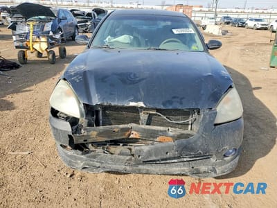 Piąte zdjęcie samochodu w środku: 2002 NISSAN ALTIMA 2.5 VIN:1N4AL11D52C112822 - miniatura