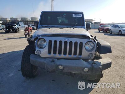 Piąte zdjęcie samochodu w środku: 2016 JEEP WRANGLER UNLIMITED SPORT VIN:1C4BJWDG8GL310597 - miniatura