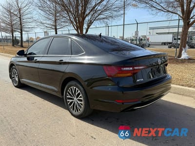 Trzecie zdjęcie samochodu z tyłu: 2019 VOLKSWAGEN JETTA S VIN:3VWC57BU1KM121009 - miniatura