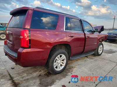 Trzecie zdjęcie samochodu z tyłu: 2020 CHEVROLET TAHOE C1500 LT VIN:1GNSCBKC9LR189029 - miniatura