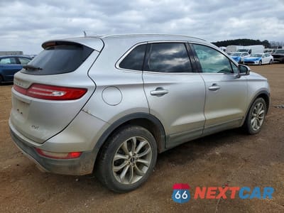Trzecie zdjęcie samochodu z tyłu: 2018 LINCOLN MKC SELECT VIN:5LMCJ2C97JUL22220 - miniatura
