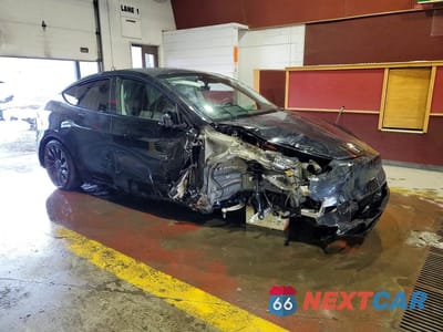 Czwarte zdjęcie samochodu z boku: 2023 TESLA MODEL Y VIN:7SAYGDEF5PF699577 - miniatura