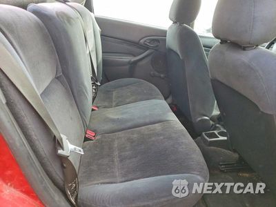 Zdjęcie 10 z 11 samochodu: 2000 FORD FOCUS SE VIN:1FAFP3434YW301056 - miniatura