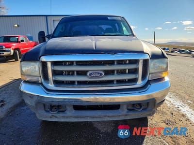 Piąte zdjęcie samochodu w środku: 2002 FORD F350 SRW SUPER DUTY VIN:1FTSW31S92EB03545 - miniatura